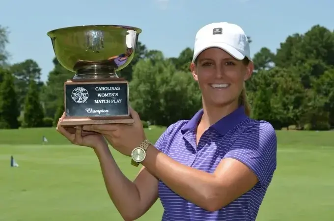 Hetzel Hoists Trophy Again